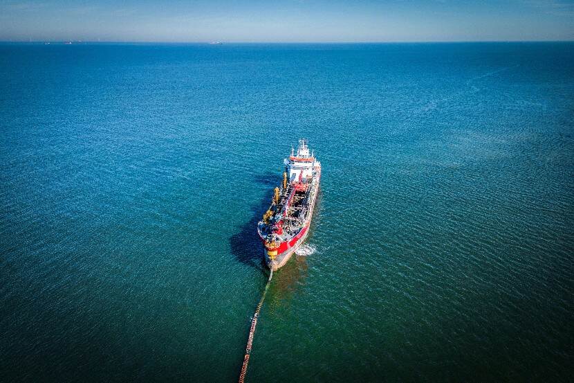 A dredger on the sea.