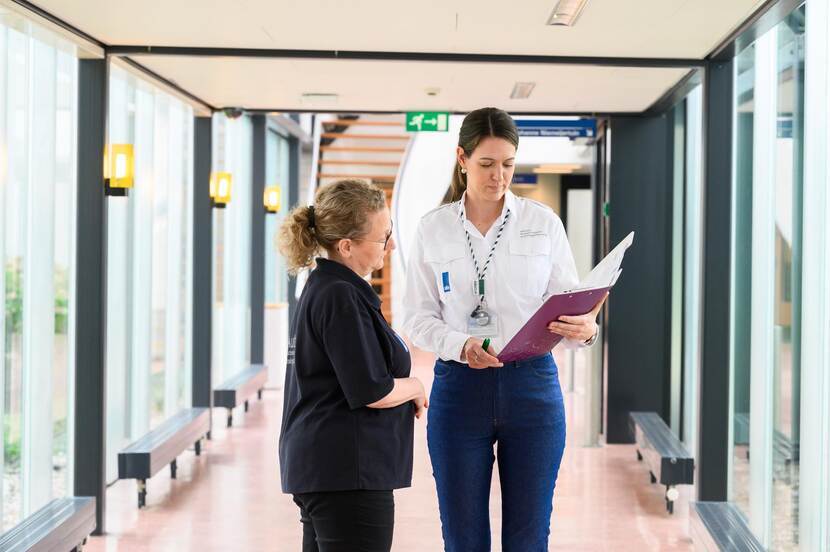 ANVS inspectors take a look at their documentation during an inspection visit